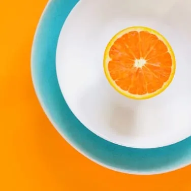 An orange slice on a plate